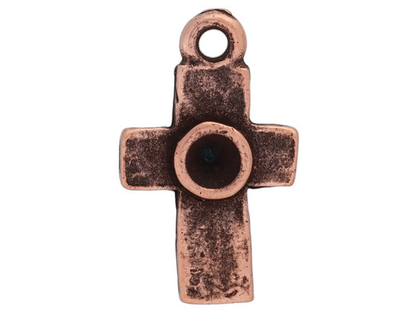 Bring a meaningful element to your designs with this tiny bezel rustic cross pendant from Nunn Design. This pendant features a simple cross shape with a small bezel in the middle. This bezel can be used to set a crystal or can be used with epoxy clay or other mixed media elements. The bezel has a diameter of 3mm and is well suited to a 24pp size chaton. This pendant has a warm copper color. Bezel Dimensions: Inner Diameter 3mm