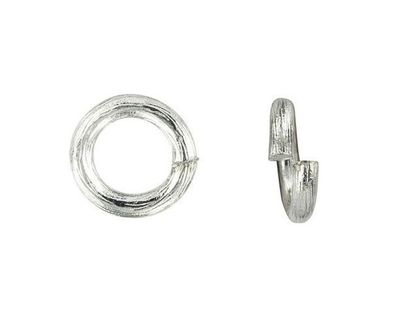 You'll love the organic style of this Nunn Design jump ring. This jump ring features a design inspired by nature, and takes on the texture of tree bark. This look will add dimension to your jewelry designs. This jump ring is versatile in size and features a thick and sturdy gauge. Use it as a strong connection point in your jewelry-making projects. This jump ring features a versatile silver shine that will work anywhere.