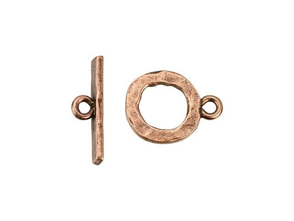 Add a fun finishing touch to your designs with the Nunn Design copper-plated pewter small hammered toggle clasp set. This simple toggle clasp set includes a straight bar component and a circular loop component. Each one has a loop attached to it so you can easily add them to designs. The hammered texture creates an earthy look perfect for modern and boho styles alike. This small clasp is great for delicate necklaces and seed bead bracelets. It features a warm copper glow. Bar Length 19mm, Hole Size 2mm/12 gauge, Loop Length 17mm, Loop Width 13mm, Opening Diameter 8.5mm