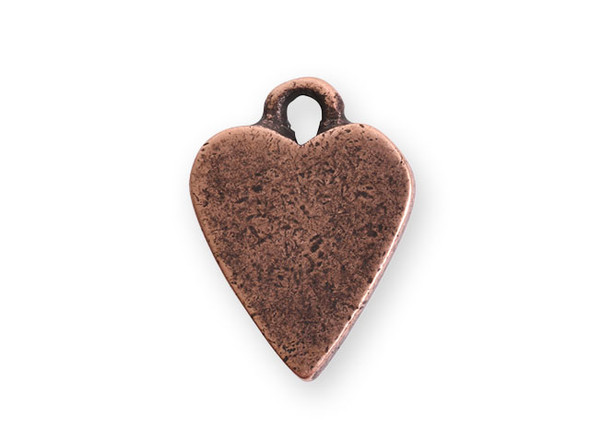 Add a sweet touch to your designs with this mini heart tag charm from Nunn Design. This tag features a flat heart shape. There is a loop at the top, so it is easy to add it to your designs. You can use it as-is or you can embellish it with stamping or decorative elements.  This charm features a warm copper color.