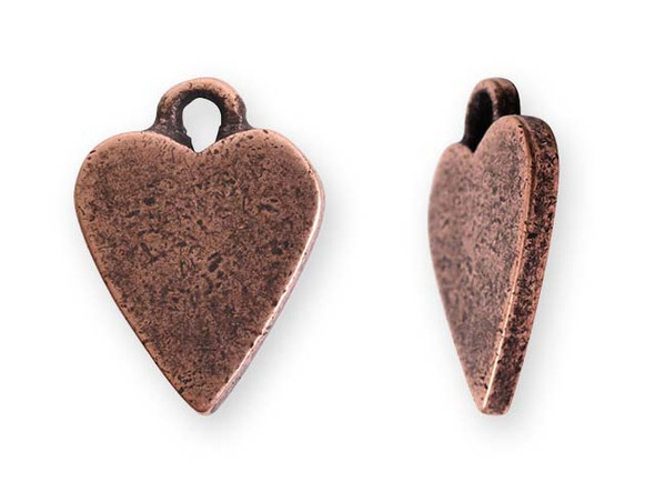 Add a sweet touch to your designs with this mini heart tag charm from Nunn Design. This tag features a flat heart shape. There is a loop at the top, so it is easy to add it to your designs. You can use it as-is or you can embellish it with stamping or decorative elements.  This charm features a warm copper color.