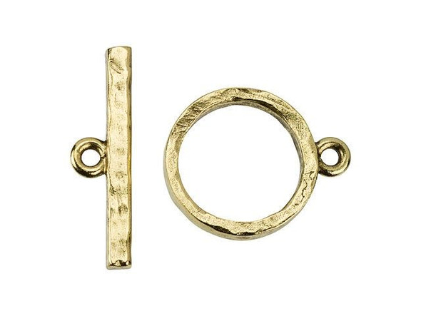 Keep your designs stylish from start to finish with the Nunn Design gold-plated pewter contemporary toggle clasp set. This simple toggle clasp set includes a straight bar component and a circular loop component. Each one has a loop attached to it so you can easily add them to designs. The hammered texture creates an earthy look perfect for modern and boho styles alike. This clasp will make your jewelry easy to take on and off, so use it in necklaces and bracelets. It features a beautiful golden glow. Bar Length 28mm, Hole Size 2mm/12 gauge, Loop Length 23mm, Loop Width 19mm, Opening Diameter 15mm