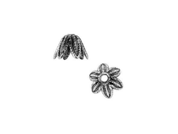 Highlight the beauty of a favorite bead with the Nunn Design 6mm antique silver-plated pewter daisy bead cap. This bead cap features a floral design, complete with six pointed petals that curve outward to form a bead cap. Each petal is decorated with small granulations, giving this bead cap a textured look. Use it to showcase a small and colorful bead. This bead displays a dark silver shine, versatile enough to work with any color palette. Diameter 6.5mm, Fits Bead Size 6mm, Hole Size 1.02mm/18 gauge, Length 5mm