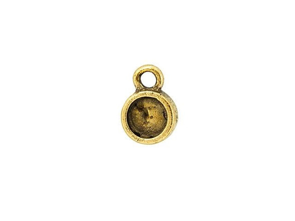 For a small showcase, try this Nunn Design bezel charm. This small charm takes on a circular shape, with a bezel that's the perfect size for holding a PRESTIGE Flatback in size SS20. You can also fill this bezel with epoxy clay or resin for a completely custom style. The loop at the top of the charm makes it easy to add to any design. Layer it with other charms or showcase this piece all on its own. It features a rich gold color full of classic appeal. Bezel Inside Diameter 5mm, Bezel Depth 1mm