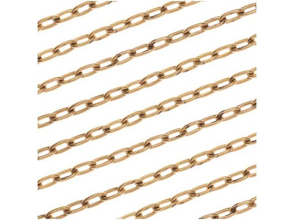 Start your next project with this Antiqued Gold Plated Brass Cable Chain from Nunn Design. This chain features lightweight oval links. The plating and finishes are designed to match all Patera findings. This chain would work great for necklace or bracelet projects. Measurements: Chain is 2.3mm wide. Each link is approximately 4.3mm long and will fit up to 18 gauge wire or jump rings. The wire making up each link is .59mm thick (20-22 gauge).