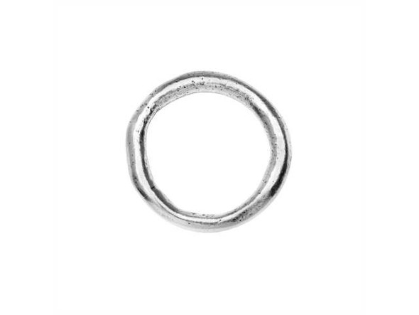 It's easy to create all kinds of styles with this Nunn Design hoop. This hoop has the look of an organic, handmade finding. It features a circular shape with an irregular surface full of artisan beauty. There are so many ways to use this component in your jewelry designs. Dangle it as a charm, use it as a toggle ring or connector, try it as a link, and more. You can use this versatile piece in all kinds of jewelry designs. It features a versatile silver shine that will work anywhere. Opening Diameter 15 - 16mm