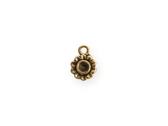 Bring floral style to your designs with this tiny bezel aster charm from Nunn Design. This charm features a flower shape with a round bezel in the center. This bezel has a 3mm diameter and works well with 24pp size chatons. There is a loop at the top of the charm which makes it easy to add to your designs. This charm features a classic gold color. Bezel Dimensions: Inner Diameter 3mm