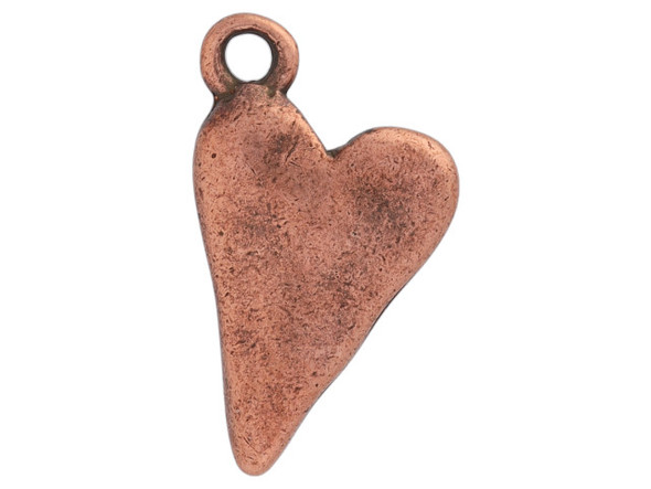 Add something sweet to your designs with this Nunn Design primitive drop heart charm. This charm has a simple elongated heart shape. There is a loop at the top corner of the charm so it is easy to use in your designs. You can use it with other charms, or even use it alone as a pendant. It features a rich warm copper color. Dimensions: 17.3 x 10mm, Hole Size: 2.1mm