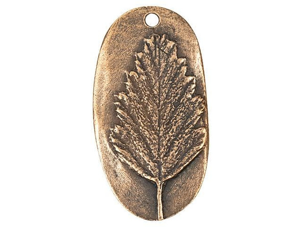 Add nature's beauty to your jewelry designs with this Nunn Design charm. This charm takes on an oval shape and the front features a raised design of an Alder leaf. The leaf is full of beautiful details that will draw the eye to your jewelry designs. Use the hole at the top of the charm to easily dangle it from necklaces and even earrings. It will make a wonderful showcase in any project. The back of the charm is flat and features an impression of the design on the front.