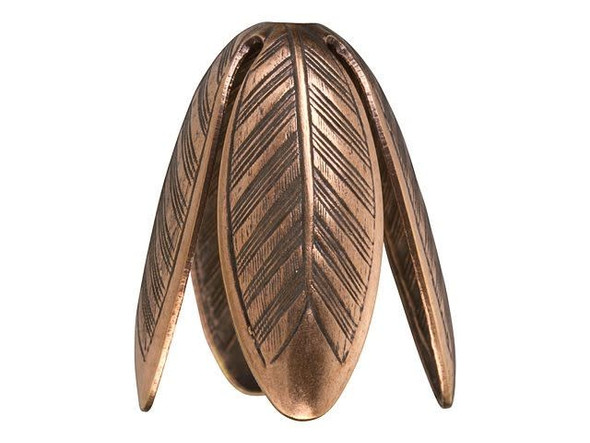 Add the beauty of nature to your style with this Nunn Design bead cap. This bold bead cap features long leaf shapes creating a cone style for this bead cap. Each leaf features wonderful detail, for a style that's sure to stand out. Layer it with large beads, make it the start of a seed bead or leather tassel, combine it with other bead caps, and more. This high-quality component will have you designing in new ways. This cap features a warm copper glow, perfect for earthy color palettes. Fits Bead Size 14mm, Hole Size 2mm/12 gauge, Length 19mm, Width 17mm