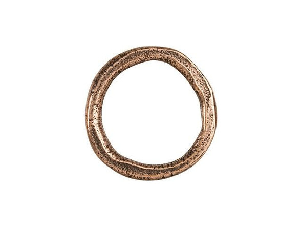 Create interesting styles with this Nunn Design hoop. This hoop has the look of an organic, handmade finding. It features a circular shape with an irregular surface full of artisan beauty. There are so many ways to use this component in your jewelry designs. Dangle it as a charm, use it as a toggle ring or connector, try it as a link, and more. You can use this versatile piece in all kinds of jewelry designs. It features a warm copper glow full of rich beauty. Opening Diameter 15 - 16mm