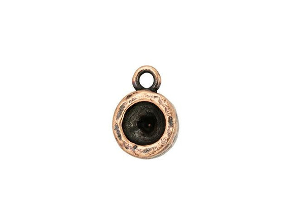 Dazzling jewelry style starts with this Nunn Design bezel charm. This charm features a circular bezel perfect for showcasing a PRESTIGE Crystal Components Chaton in size SS29. You can also fill the bezel with epoxy clay or resin for a completely custom look. A loop at the top of the charm makes it easy to add to your designs. Use it in necklaces, bracelets, and earrings. This charm features a warm copper color full of rich beauty. Bezel Inside Diameter 6.75mm