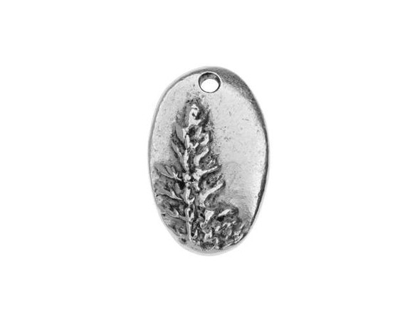 Bring the beauty of the forest to your style with this Nunn Design charm. This charm features an oval shape with organic style. The front is decorated with a raised design of a pine tree, which captures the details of the forest beautifully. The back of this charm is plain. A small hole at the top of the charm makes it easy to add to designs. Use it in bracelets, earrings, or even as a focal in a delicate necklace. It features a versatile silver shine that will work with any color palette. Hole Size 1.63mm/14 gauge, Length 21mm, Width 13mm