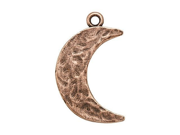 Fill your designs with the celestial style of this Nunn Design charm. This flat charm takes on the simple shape of a crescent moon. It features a hammered surface full of organic, artisan style, giving it a handmade look. This charm makes a great stand-alone accent, or it can be metal stamped or engraved upon. Use the small loop at the top to attach it to necklaces, bracelets, and even earrings. This charm displays a warm copper glow full of rich beauty.