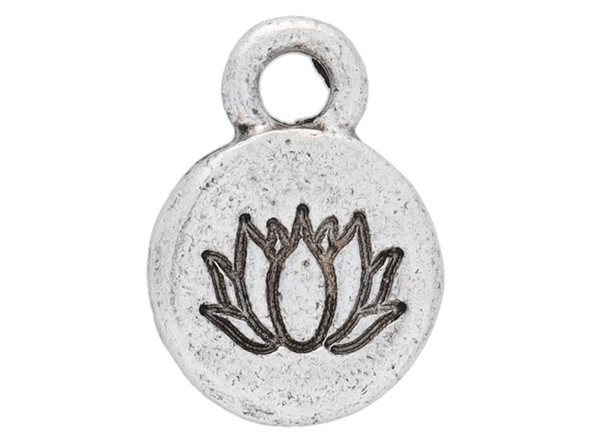 Create meaning in your style with the Nunn Design antique silver-plated pewter Itsy spiritual lotus round charm. This charm is circular in shape and features a lotus blossom decorating the front. The lotus blossom is a symbol often associated with purity. The back of the charm is plain and flat. A small loop is attached to the top, making it easy to add to designs. Dangle it from necklaces, bracelets and even earrings. It is small in size, so you can use it anywhere. It features a versatile silver shine. Hole Size 2mm/12 gauge, Length 12.5mm, Width 9mm