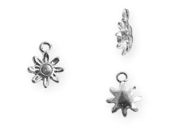 Add a flowery touch to your designs with this tiny bezel daisy charm from Nunn Design. This charm features a daisy shape with a round bezel in the center. This bezel has a 3mm diameter and works well with 24pp size chatons. There is a loop at the top of the charm which makes it easy to add to your designs. This charm features a versatile silver shine. Bezel Dimensions: Inner Diameter 3mm