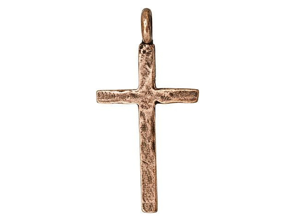 Add a meaningful touch to jewelry designs with this Nunn Design cross. This simple charm takes on the shape of a cross. The hammered texture adds an organic and handmade beauty to the charm. A loop is attached to the top of the cross, so you can easily string this charm into designs, dangle it, and more. Try it in an Easter style or use it to give a spiritual touch to any style. This charm features a warm copper glow full of rich beauty.