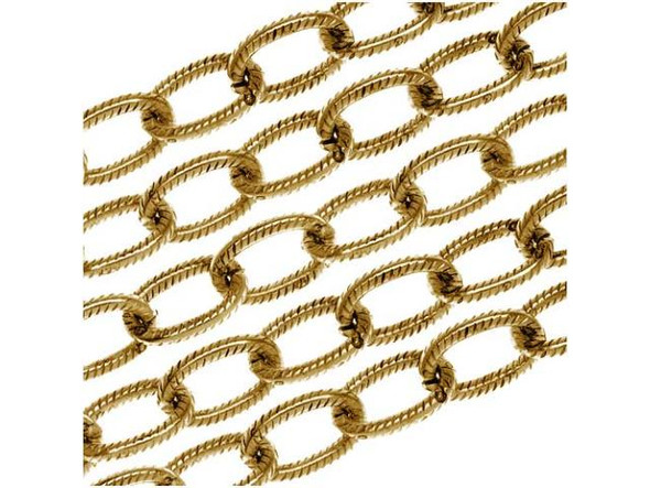 Start your next design with this Antiqued Gold Plated Brass Cable Chain from Nunn Design. This chain features lightweight oval links that have texture on the inside of each link. The plating and finishes are designed to match all Patera findings. Measurements: Chain is 6.4mm wide. Each link is approximately 9.5mm long. The wire making up each link is 1.3mm thick (15 gauge).