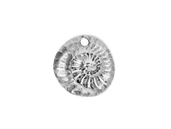 Ocean style can be yours with this Nunn Design charm. This charm features an organic circular shape and a raised and textured design of nautilus on the front. This charm speaks not only of the beauty of sea life, but also of all the fossils of days gone by. The back of this charm is plain. A small hole at the top of the charm makes it easy to add to designs. Showcase it in earrings, necklaces, and even bracelets. It features a versatile silver shine that will work with any color palette. Hole Size 1.63mm/14 gauge, Length 17mm, Width 16.5mm