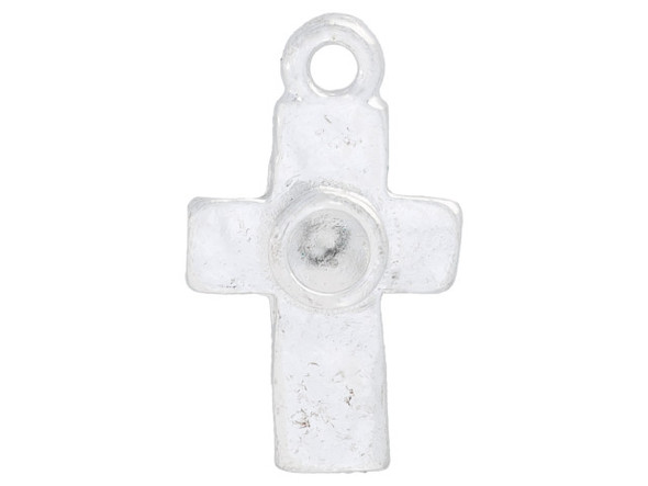 Bring a meaningful element to your designs with this tiny bezel rustic cross pendant from Nunn Design. This pendant features a simple cross shape with a small bezel in the middle. This bezel can be used to set a crystal or can be used with epoxy clay or other mixed media elements. The bezel has a diameter of 3mm and is well suited to a 24pp size chaton. This pendant has bright silver shine that will work with any palette. Bezel Dimensions: Inner Diameter 3mm