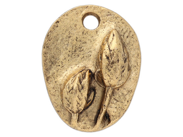 You&rsquo;ll love the detail of this small prairie pod charm from Nunn Design. This charm is oval-shaped and features a raised design of two flowers on the front.  The back is flat and plain. There is a hole at the top of the charm so it is easy to add it to your designs. This charm features a classic gold color. Dimensions: 13.5 x 10.5mm, Hole Size: 2.0mm