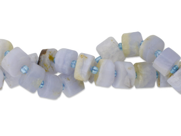 Bring gemstone accents to your designs with this Dakota Stones blue lace agate freeform 10 x 5mm heishi bead strand. These beads feature a coin-like heishi shape. They vary in thickness which lends added variety. Blue Lace Agate is a naturally occuring soft blue agate, laced with bands or swirls of brighter blue, periwinkle, white and occasionally gray or brown. It is one of the most rare and sought after forms of Agate. Metaphysical Properties: Blue Lace Agate is said to represent encouragement and bring clarity. Size: About 10 x 5mm, Hole Size: 0.8mm