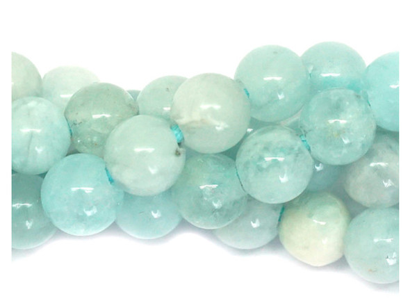 Gemstone beauty fills these aquamarine beads from Dakota stones. These beads are perfectly round in shape and feature a versatile size that you can use in all kinds of designs. These beads would look wonderful in matching necklace and bracelet sets. Their large stringing hole makes these beads great for use with thicker stringing materials. Aquamarine is the Latin term for &ldquo;water of the sea.&rdquo; This stone was once thought to be the treasure of mermaids, as well as a lucky stone for sailors. Because gemstones are natural materials, appearances may vary from bead to bead.