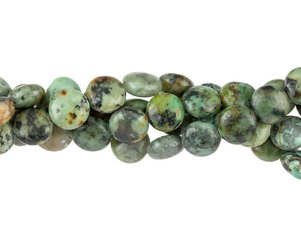 Add an organic element to jewelry designs with these Dakota Stones gemstone beads. These beads feature a versatile round coin shape. Use them in matching jewelry sets. This stone is mined in Africa and is actually a type of spotted teal Jasper rather than turquoise. It is given its industry name because the matrix structure and shade is similar to that of turquoise. Metaphysical Properties: Often called the stone of evolution, African Turquoise Jasper encourages growth and development not only in the body, but in the mind. Some spiritualists believe that it will attract money to the wearer.Because gemstones are natural materials, appearances may vary from piece to piece. Each strand includes approximately 24 beads.