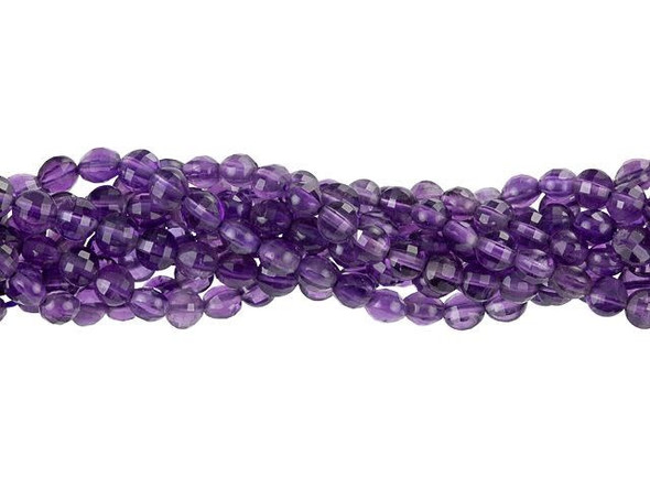 For a regal display, add these Dakota Stones amethyst beads to your designs. These small gemstone beads feature a circular shape with a puffed edge and a checkerboard faceted face. The surface catches the light in a multitude of directions. The stringing hole is wide enough to use with 20 gauge wire. Use these small beads as accents of color and shine in all kinds of jewelry projects. They feature deep purple color. Amethyst is the official birthstone of February. Metaphysical Properties: This stone's name is derived from the Greek word amethystos, meaning "not drunken." People of ancient times believed it to protect the wearer from drunkenness. Today, this gemstone is believed to promote happiness. Because gemstones are natural materials, appearances may vary from piece to piece. Each strand includes approximately 99 beads.