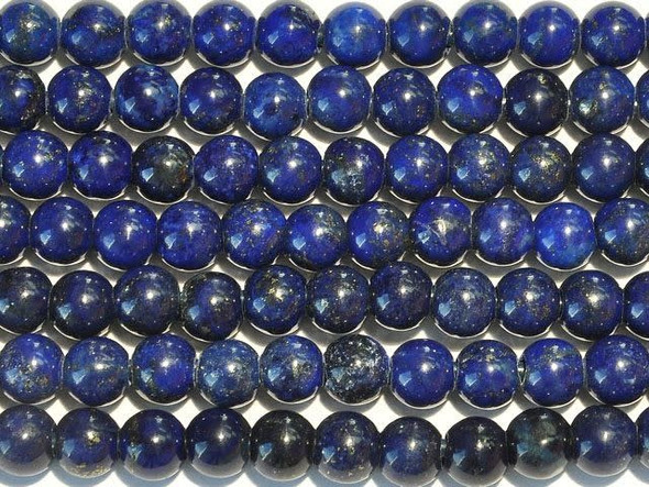 Add magical nighttime color to your designs with the lapis lazuli 8mm large-hole round beads from Dakota Stones. Available by the strand, these gemstone beads will amaze and delight with their innovative design. Each bead features a wide stringing hole, perfect for using with thicker stringing materials like leather cord. In fact, these beads are temporarily strung on leather cord. These perfectly round beads display dark blue color accented with golden shimmer. Lapis lazuli is a semi-precious stone that contains primarily lazurite, calcite and pyrite. It was among the first gemstones to be worn as jewelry and worked on. Metaphysical Properties: Lapis lazuli is said to enhance insight, intellect and awareness.Because gemstones are natural materials, appearances may vary from bead to bead. Each strand includes approximately 24 beads.