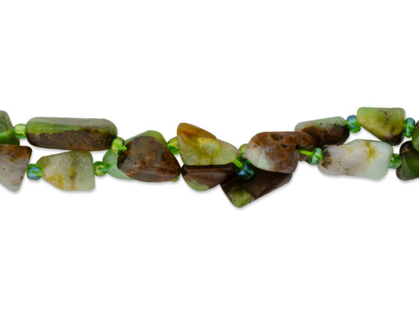 Bring earthy style to your designs with this Dakota Stones Australian chrysoprase 15 x 6mm nugget bead strand. These beads feature organic shapes that let each bead be unique. These beads feature a mix of green, brown and yellow colors. Chrysoprase is a gemstone variety of chalcedony and contains small quantities of nickel. These beads feature varying shades of green, from mint to moss, along with hints of brown and gray. Metaphysical Properties: Chrysoprase is said to be a stone that encourages hope and joy. Because gemstones are natural materials, appearances may vary from piece to piece. Size: About 15 x 6mm, Hole Size: 0.8mm