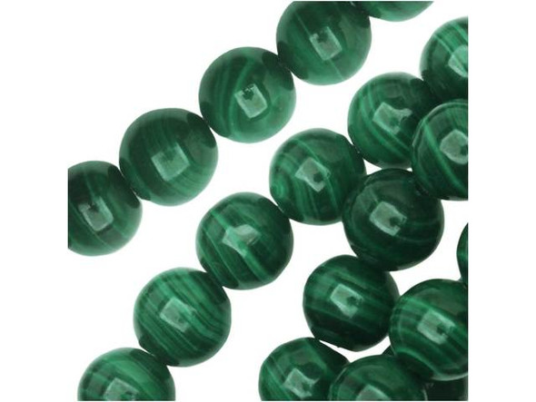 Earthy elegance fills these Dakota Stones gemstone beads. Malachite is a copper carbonate with a bright green color and dark green banding. Usually found near copper deposits, it is formed through the combination of carbonated water, limestone and copper. Famous malachite mines in the Ural mountains of Russia once produced 20-ton blocks of the stone, while today it is primarily mined in Africa. Malachite was used extensively as decoration in the palaces of Russian tsars and forms the columns of St. Isaacs Cathedral in St. Petersburg, Russia. Because gemstones are natural materials, appearances may vary from bead to bead.