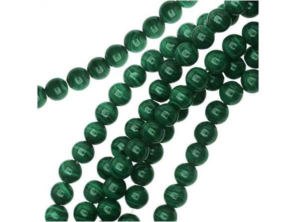 Earthy elegance fills these Dakota Stones gemstone beads. Malachite is a copper carbonate with a bright green color and dark green banding. Usually found near copper deposits, it is formed through the combination of carbonated water, limestone and copper. Famous malachite mines in the Ural mountains of Russia once produced 20-ton blocks of the stone, while today it is primarily mined in Africa. Malachite was used extensively as decoration in the palaces of Russian tsars and forms the columns of St. Isaacs Cathedral in St. Petersburg, Russia. Because gemstones are natural materials, appearances may vary from bead to bead.