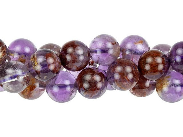 Cacoxenite is the trade name for this naturally occurring blend of seven stone types. This stone, often called the "Super Seven" or "Melody Stone" contains amethyst, clear quartz, smoky quartz, lepidocrosite, goethite, and rutile. Showcase these bold round beads in long necklace strands. You'll love the smoky purple and brown colors. Metaphysical Properties: Cacoxenite is said to be a healing and harmonizing stone. Because gemstones are natural materials, appearances may vary from bead to bead. Each strand includes approximately 40 beads.