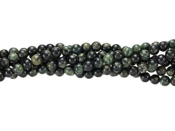 Swirling shades of black and green combine in these Dakota Stones gemstone beads. These beads are round in shape for a classic look you can add to any design. They are small in size, so use them as spacers or as pops of color in earrings. Kambaba jasper is mined exclusively in Africa and is also known as crocodile jasper due to its combination of dusky green base color and deep brown and black tapered oval rings. The swirling green color is caused by ancient fossilized algae, one of the oldest known forms of life on earth. Metaphysical Properties: Like all jaspers, this stone is metaphysically tied to grounding and protection. It's also said to enhance endurance, patience, and insight. Because gemstones are natural materials, appearances may vary from piece to piece. Each strand includes approximately 52 beads.