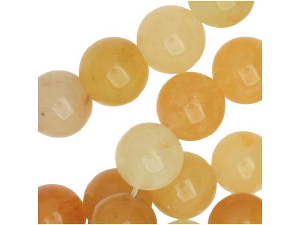 Add mellow color to designs with the Dakota Stones yellow Jade 8mm round beads. Available by the strand, these beads are perfectly round in shape, so they will work well in classic styles. They are the perfect size for matching necklaces and bracelets. This stone features an array of shades from deep oranges to creamy off white tones. Yellow Jade is the industry name for this natural serpentine. It has a Mohs hardness of 6-6.5.  Because gemstones are natural materials, appearances may vary from bead to bead. Each strand includes approximately 24 beads.