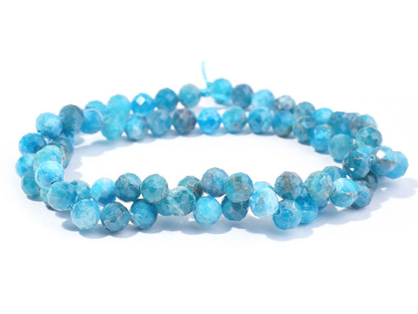 Gemstone style fills these beads from Dakota Stones. These blue apatite beads have a round shape with facets that catch the light. Blue apatite is a blue transparent phosphate material. It derives from the Greek word "apate," meaning to deceive, because it is often mistaken for other stones. The color of this material is such a vibrant blue that it is difficult to believe it could be found naturally. But this color is 100% natural. Mined in Brazil, Mexico, Myanmar, Africa and the USA, this stone has a Mohs hardness of 5. Metaphysical Properties: Often called a dual-action stone, blue apatite is used to achieve goals. It removes negativity, confusion and stimulates the mind to expand knowledge and truth. It is a great stone for encouraging inspiration and is famous for deepening meditation.Because gemstones are natural materials, appearances may vary from piece to piece.