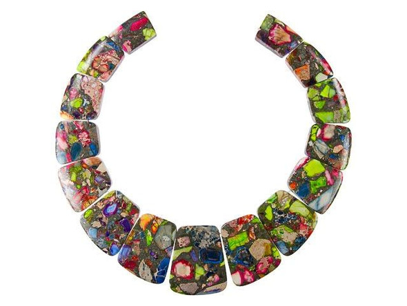 Stand out with a colorful display in your jewelry designs. This mixed impression graduated collar set from Dakota Stones includes 15 focal beads in graduated sizes. You can use them all together to create a stunning statement necklace, or add a few to several different projects. There are plenty of beads to work with in this set. These gemstone beads feature a medley of colors, from blue and green to pink, purple, and more. Please note that mixed Impression Jasper is a composite gemstone. Metaphysical Properties: Impression Jasper is used to find clarity and inner peace.Because gemstones are natural materials, appearances may vary from bead to bead.Length 15.5-35.5mm, Width 23-29mm