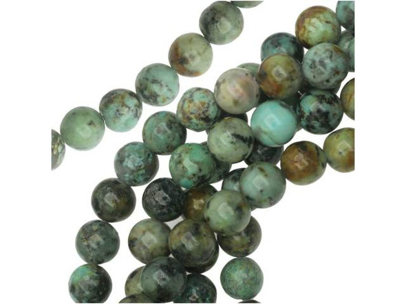 Bring fascinating style to designs with these Dakota Stones beads. These gemstone beads are perfectly round in shape and would look great in matching necklace and bracelet sets. The beads feature turquoise color with a brown and black matrix. This stone is mined in Africa and is actually a type of spotted teal Jasper rather than turquoise. It is given its industry name because the matrix structure and shade is similar to that of turquoise. It has a Mohs hardness of 6. Metaphysical Properties: Often called the stone of evolution, African Turquoise Jasper encourages growth and development not only in the body, but in the mind. Some spiritualists believe that it will attract money to the wearer.Because gemstones are natural materials, appearances may vary from piece to piece. Each strand includes approximately 24 beads.