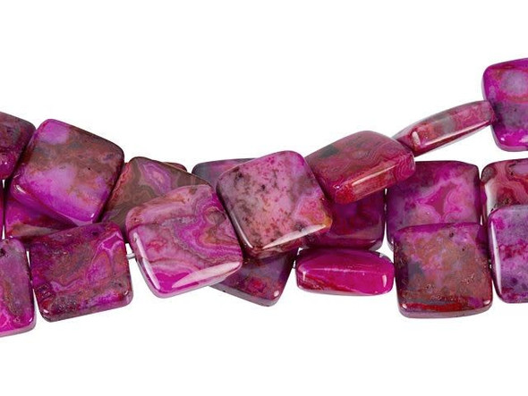 Keep your style fun with these Dakota Stones beads. These gemstone beads feature a funky square shape that will stand out in your style. Use them in necklaces, bracelets, and earrings. Each bead displays deep pink color full of swirling patterns. Contrast these beads with black to make them really pop. Mexican crazy lace agate is normally an opaque white gemstone with swirling patterns, but these beads are color enhanced with pink coloring to emphasize these beautiful patterns. Color enhancing is common amongst agates to make them fashionably relevant. They have a Mohs hardness of 6.5-7.Metaphysical Properties: Often called the happy stone, crazy lace agate promotes laughter and optimism. Because gemstones are natural materials, appearances may vary from bead to bead. Each strand includes approximately 16 beads.
