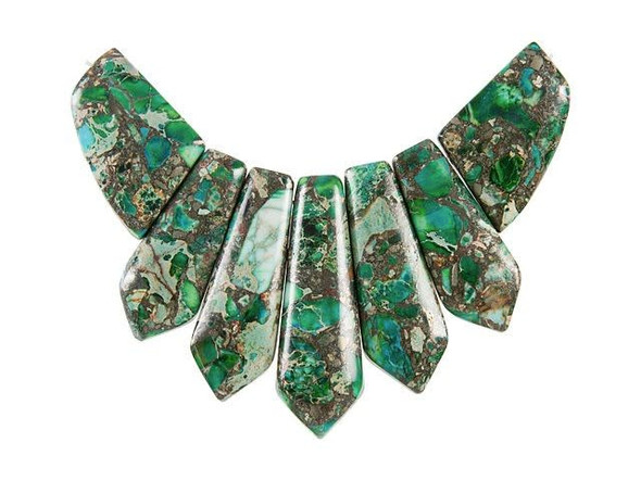 Give your designs a bold and lush look with this Dakota Stones pendant set. This pendant set includes seven eye-catching and pointed gemstone drop beads in graduated sizes you can easily use in stringing projects. Slide them all together in designs or use them separately. They would even make beautiful elements in bead embroidery. These beads combine green Impression Jasper and pyrite, for swirling green and golden brown colors. Please note that these beads are made from composite gemstones.Because gemstones are natural materials, appearances may vary from bead to bead.Length 25-45.5mm, Width 15.5-25mm