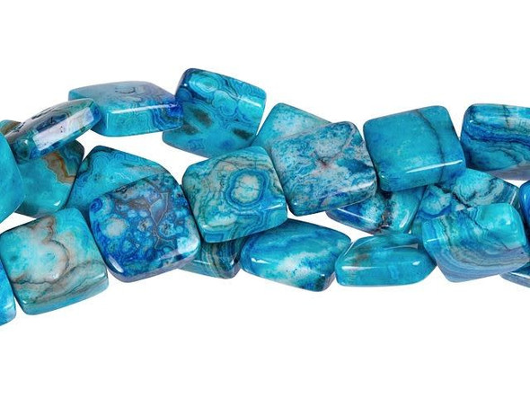 Add the color of ocean waters to your jewelry designs. These Dakota Stones gemstone beads are square in shape and display beautiful blue patterns that look like rippling water. They're perfect for showcasing in necklaces, bracelets, and even earrings. Mexican crazy lace agate is normally an opaque white gemstone with swirling patterns, but these beads are color enhanced with blue coloring to emphasize these beautiful patterns. Color enhancing is common amongst agates to make them fashionably relevant. They have a Mohs hardness of 6.5-7. Metaphysical Properties: Often called the happy stone, crazy lace agate promotes laughter and optimism. Because gemstones are natural materials, appearances may vary from piece to piece. Each strand includes approximately 16 beads. 
