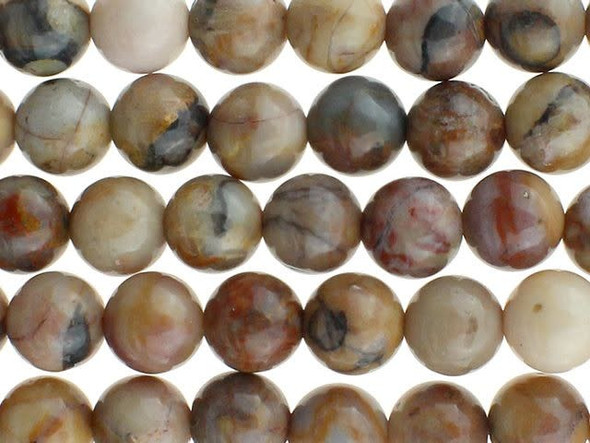 Bring natural color to your designs with the Dakota Stones 6mm Venus Jasper round beads. These beads are perfectly round in shape, so you can use them with any style. They are versatile in size, so you can use them in necklaces, bracelets and even earrings. These gemstone beads feature warm, earthy tones like beige, peach, brown and gray. They are sure to add soothing style to your designs. Venus Jasper takes its name from the planet Venus, which was named for the Roman goddess of love and beauty. It is also referred to as orbicular rhyolite. Metaphysical Properties: Jasper is a stone used from grounding, stability, strength and healing.Because gemstones are natural materials, appearances may vary from piece to piece. Each strand includes approximately 34 beads. 