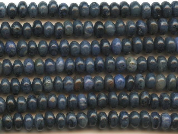 Add spots of blue color to your designs with these Dakota Stones dumortierite beads. These beads feature colors ranging from dark blue and blue-green to cloudy white. These beads feature a rounded shape that would work well as spacers between larger beads. Add these beads to a design featuring copper elements. Dumortierite is a fibrous variably colored aluminum boro-silicate mineral. They crystals are vitreous and vary in color. Metaphysical Properties: Known as the "Stone of Order," dumortierite is said to help boost intellectual perception and to help in becoming more organized.Because gemstones are natural materials, appearances may vary from bead to bead. Each strand includes approximately 34 beads. 