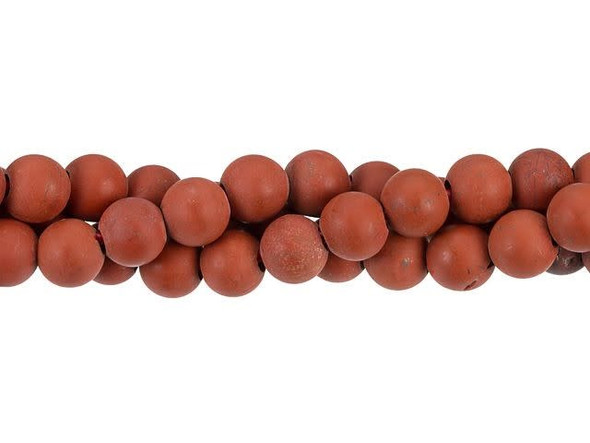Rich style fills these red Jasper beads from Dakota Stones. Available by the strand, these gemstone beads are perfectly round in shape, so you can use them in all kinds of styles. Each bead features a wide stringing hole, perfect for using with thicker stringing materials like leather cord. They feature rich terracotta red color with a soft matte appearance. They would make wonderful accents to copper tones. Metaphysical Properties: Known as a stone of passion, red Jasper is said to bring focus and energy while manifesting creative ideas.Because gemstones are natural materials, appearances may vary from bead to bead. Each strand includes approximately 24 beads.