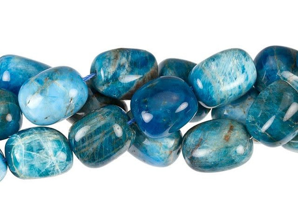 Add gemstone splash to your style with these blue apatite beads from Dakota Stones. These beads feature rounded nugget shapes, giving them a pebble-like look. You can showcase them in long necklace strands. They feature sea-worthy colors, including dark blue, ocean green and hints of foamy white. Blue apatite derives its name from the Greek word "apate," meaning to deceive, because it is often mistaken for other stones. Metaphysical Properties: Often called a dual-action stone, blue apatite is used to achieve goals. It removes negativity, confusion and stimulates the mind to expand knowledge and truth. It is a great stone for encouraging inspiration and is famous for deepening meditation.Because gemstones are natural materials, appearances may vary from piece to piece. Each strand includes approximately 17 beads.