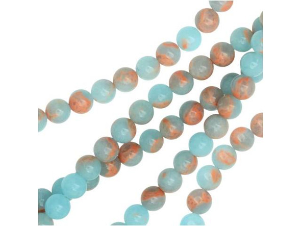 Create soothing style with these gemstone beads. These powder blue impression jasper beads from Dakota Stones feature a classic round shape that will work anywhere. They display a soft sky blue color interspersed with hints of peachy color. These beads will bring a dreamy, airy look to your designs. They are versatile in size, so you can use them in necklaces, bracelets, and even earrings. Metaphysical properties: Jasper is said to be a stone of tranquility that will soothe nerves and banish negative thoughts.Because gemstones are natural materials, appearances may vary from piece to piece. Each strand includes approximately 34 beads.