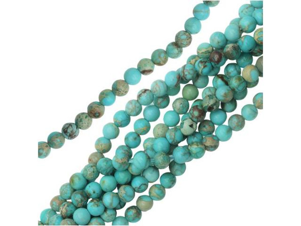 Put accents of bright blue in your style with these Dakota Stones impression jasper beads. These gemstone beads are perfectly round in shape, so they will work in a variety of designs. They are small in size, so you can use them as spacers between larger beads or just as small accents of color. Impression jasper comes in a variety of colors. These beads have been dyed a bright aqua blue color, which creates a striking contrast with the tan and crimson matrix colors. Metaphysical properties: Impression Jasper is used to find clarity and inner peace.Please note that these beads are made from composite gemstones. Because gemstones are natural materials, appearances may vary from piece to piece. Each strand includes approximately 52 beads.
