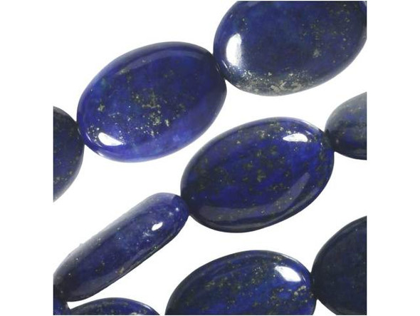 These lapis lazuli 10x14mm oval beads from Dakota Stones feature intense blue color like that of a desert night sky. These simple oval-shaped beads feature deep blue color flecked with golden sparkles. Lapis lazuli is a semi-precious stone that contains primarily lazurite, calcite and pyrite. It was among the first gemstones to be worn as jewelry and worked on. Metaphysical Properties: Lapis lazuli is said to enhance insight, intellect and awareness.Because gemstones are natural materials, appearances may vary from bead to bead. Each strand includes approximately 14 beads. 