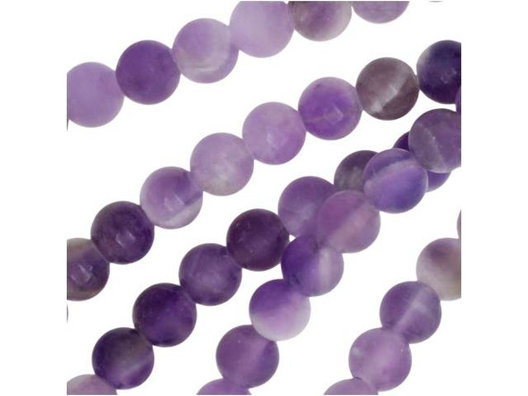 Put pops of purple into your style. These Dakota Stones dog teeth amethyst beads feature purple and white colors full of elegance. They are small beads and round in size, so you can use them as accents of color in necklaces, bracelets, and earrings. Dog teeth amethyst is a combination of amethyst and white quartz mixed together in a striped, chevron pattern. It is named for its resemblance to the dog tooth violet. This stone is also known as chevron amethyst. Metaphysical Properties: Dog teeth amethyst is said to help remove resistance to change and to dissipate and repel negativity of all kinds. Because gemstones are natural materials, appearances may vary from bead to bead. Each strand includes approximately 52 beads. Our amethyst beads have nice, deep color, but may show natural inclusions. Dakota Stones Matte Dog Teeth Amethyst Round Bead Strand These beads are beautiful in person. So glad I bought them. Karen J, Serious Artbeader 